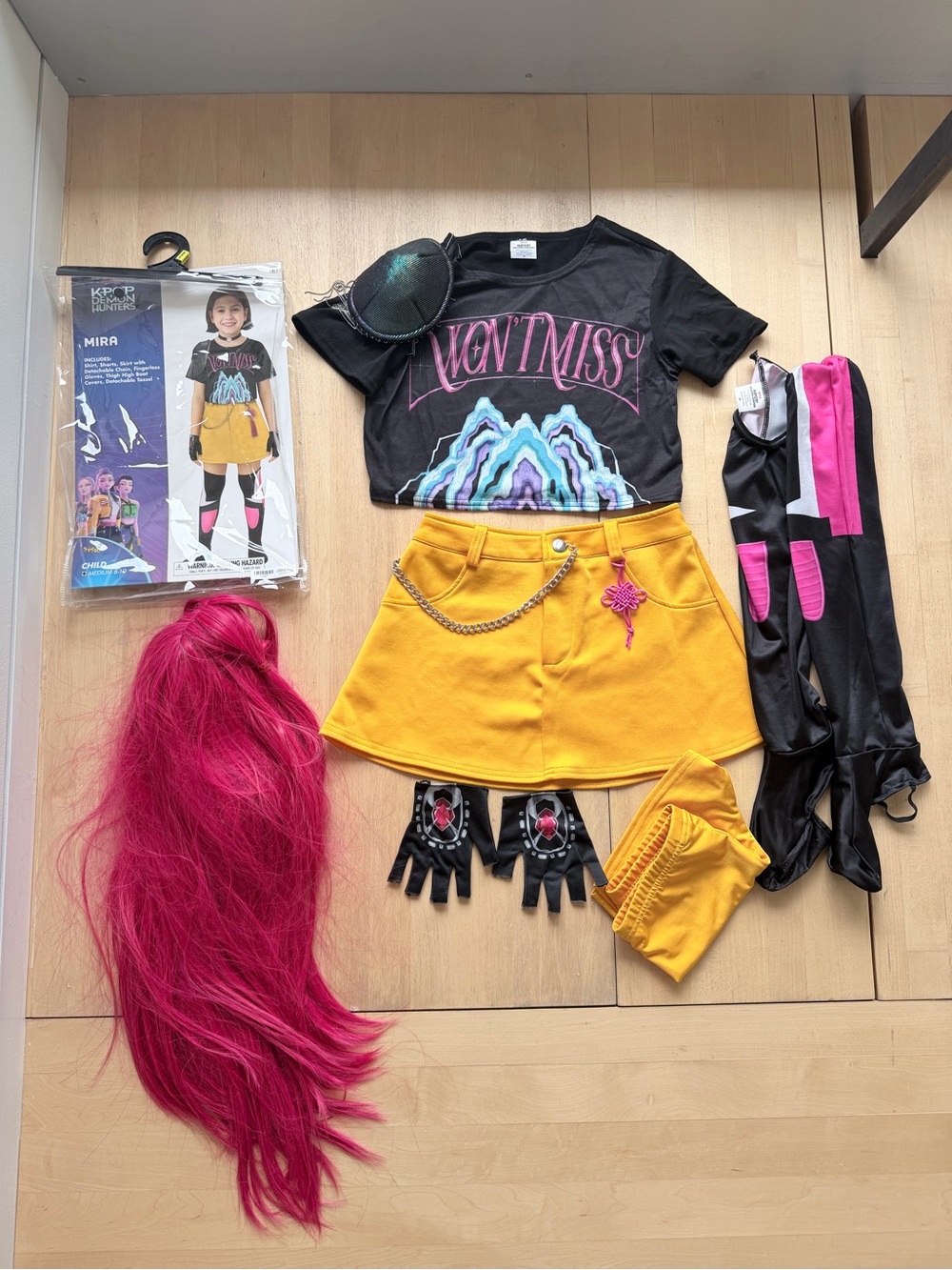 Spirit Yellow Skater Skirt Costume Set with Black Graphic Tee and Pink Wig